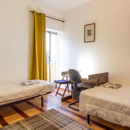 Rent this 6 bed room on Rua Pedro Nunes 9 in 1050-170 Lisbon, Portugal
