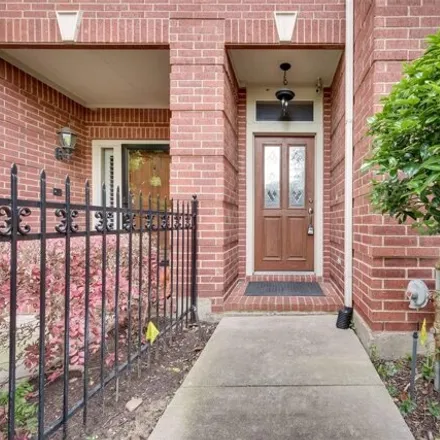 Rent this 3 bed townhouse on Howell Street in Dallas, TX 75204