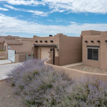 Buy this 4 bed house on 2516 Chessman Drive Northeast in Rio Rancho, NM 87124