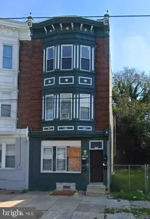 Buy this 3 bed house on Woodland Auto Repair in 7002 Woodland Avenue, Philadelphia