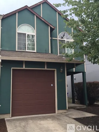 Rent this 3 bed townhouse on 4846 NE 9th Ave