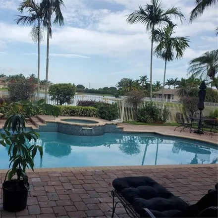 Rent this 5 bed house on 1525 Victoria Isle Way in Weston, FL 33327