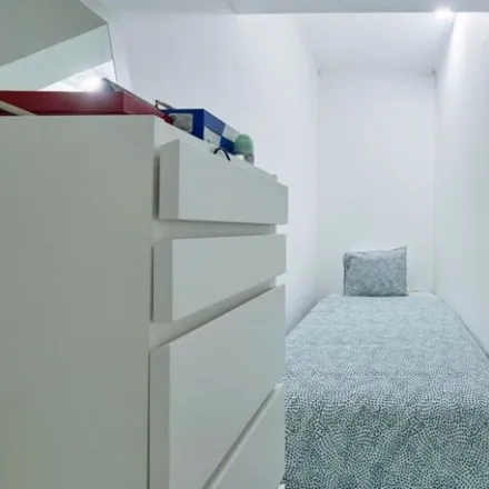 Rent this 3 bed room on Rua Carlos Malheiro Dias 10 in 1700-108 Lisbon, Portugal
