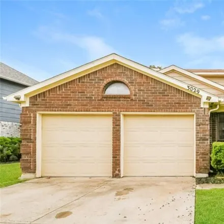 Rent this 3 bed house on 3029 Rustlewind Ln in Grand Prairie, Texas