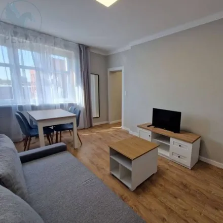 Rent this 1 bed apartment on CM LUX MED in Ułańska 7, 60-748 Poznań