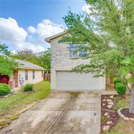 Rent this 4 bed house on 8705 Davis Oaks Trail in Austin, TX 78715