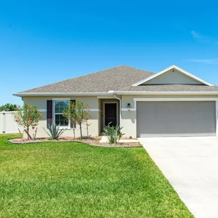 Buy this 4 bed house on 1187 Potenza Drive in West Melbourne, FL 32904
