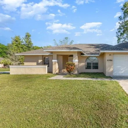 Image 2 - 744 Cereus Avenue Northwest, Palm Bay, FL 32907, USA - House for sale