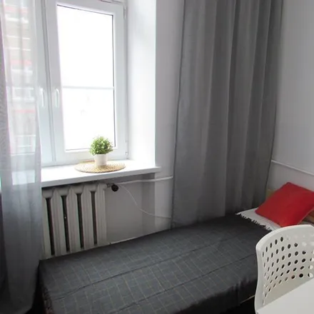 Rent this 4 bed room on Targowa in 03-733 Warsaw, Poland