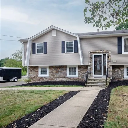 Buy this 4 bed house on Sleepy Hollow Circle in East Haven, CT 06512