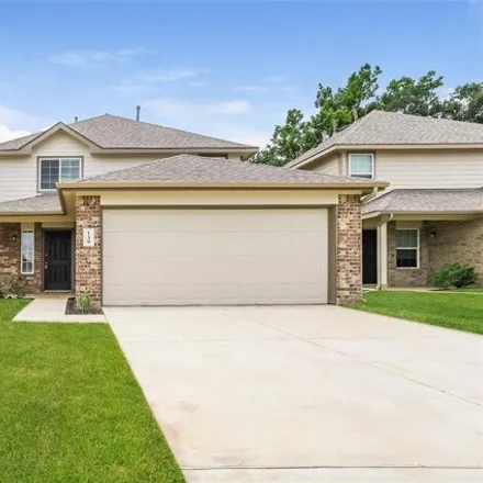 Rent this 4 bed house on Cooper Creek Lane in Willis, TX 77305