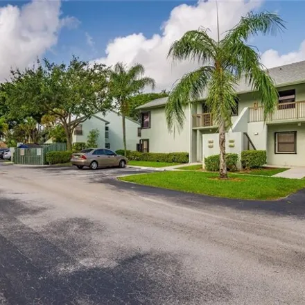 Buy this 2 bed condo on Karanda Village IV in Coconut Creek, FL 33066