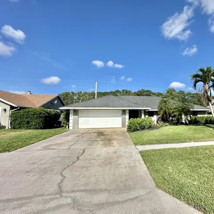 Rent this 3 bed house on 540 Indigo Avenue in Wellington, FL 33414