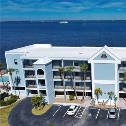 Buy this 3 bed condo on Jamaica Way in Fishermens Village, Punta Gorda