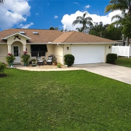 Image 1 - 59 Essex Lane, Palm Coast, FL 32164, USA - House for sale