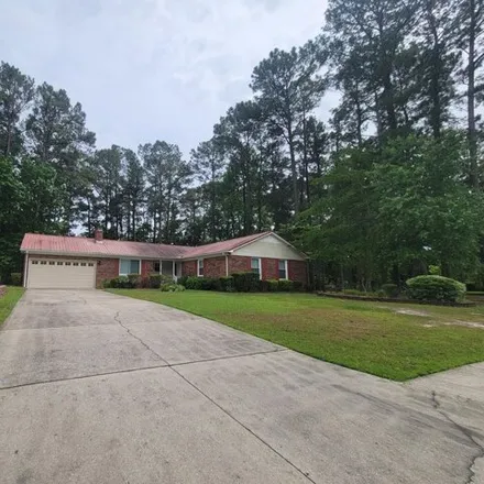 Buy this 4 bed house on 900 Welsh Lane in Country Club Hills, Jacksonville