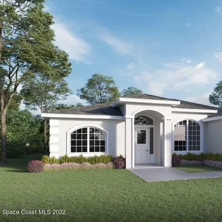 Buy this 5 bed house on 2199 Sapelo Avenue Southeast in Palm Bay, FL 32909