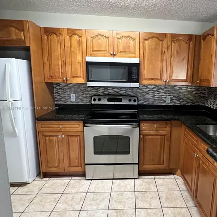 Rent this 3 bed condo on 3327 Northwest 108th Drive in Coral Springs, FL 33065