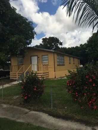 Buy this studio apartment on 471 South Coconut Road in Pahokee, Palm Beach County