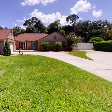Rent this 4 bed house on 2560 Spreading Oaks Lane in Jacksonville, FL 32223