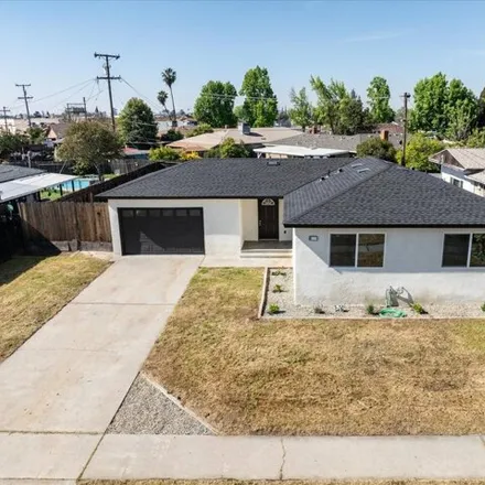 Buy this 3 bed house on 4836 East Floradora Avenue in Fresno, CA 93727