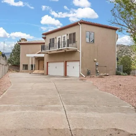 Buy this 5 bed house on 13898 Waterlily Court Southeast in Winterwood Park (HOA), Albuquerque