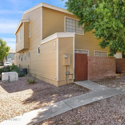 Buy this 2 bed townhouse on Gazebo in West Westbrook Condominiums, Mesa