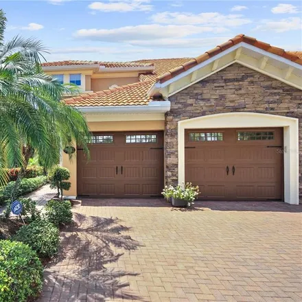 Buy this 4 bed townhouse on 9009 Della Scala Circle in Dr. Phillips, FL 32836