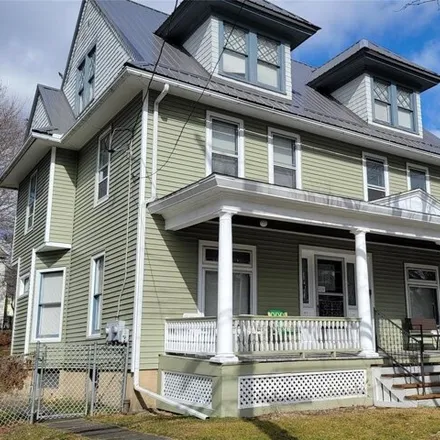 Buy this 8 bed house on 26 1/2 Lathrop Avenue in City of Binghamton, NY 13905