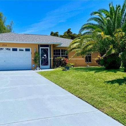 Buy this 3 bed house on 1733 SW 15th Ter in Cape Coral, Florida