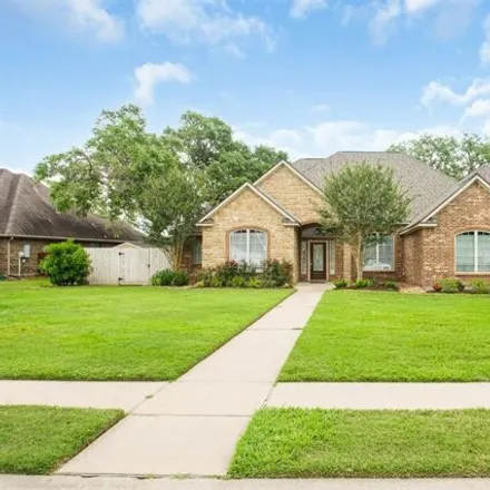Buy this 4 bed house on Enchanted Oaks Drive in Angleton, TX 77515