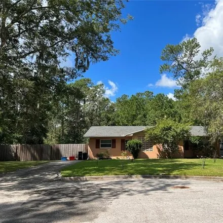 Buy this 4 bed house on 3702 Northwest 45th Street in Alachua County, FL 32606