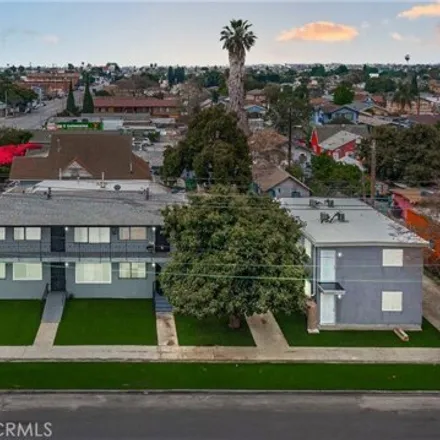 Buy this 13 bed house on San Pedro & 79th in East 79th Street, Los Angeles