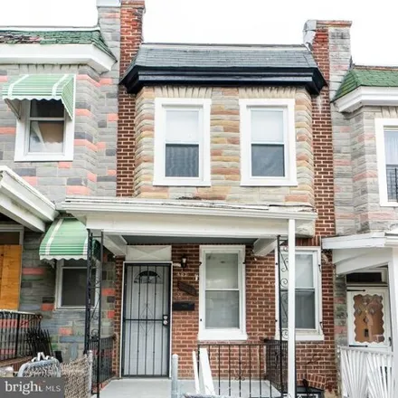 Buy this 3 bed house on 403 Poplar Grove Street in Baltimore, MD 21223