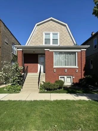 Rent this 2 bed house on 5537 North Luna Avenue in Chicago, IL 60630