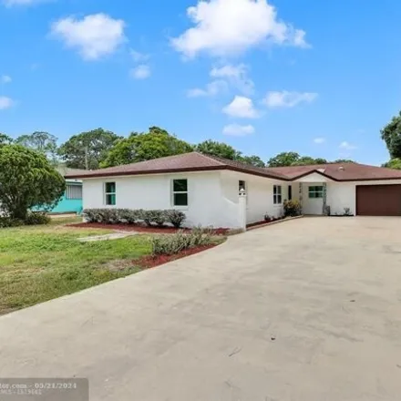 Buy this 3 bed house on 5249 Palmetto Drive in Fort Pierce, FL 34982