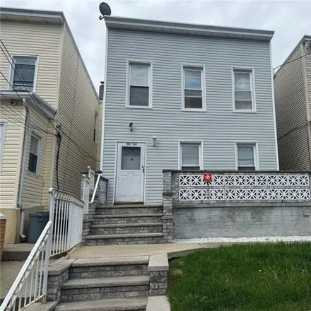 Buy this 4 bed house on 90-42 78th St in Jamaica, New York