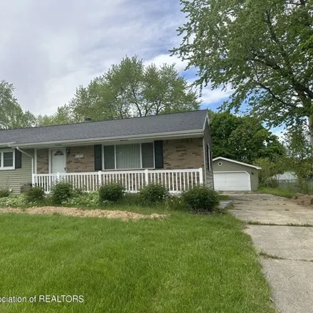 Buy this 4 bed house on 230 Woodhaven Drive in Delta Charter Township, MI 48917
