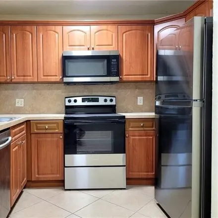 Buy this 2 bed condo on 10925 Royal Palm Boulevard in Coral Springs, FL 33065