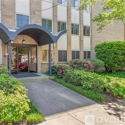 Rent this 2 bed condo on 1005 Woodrow Ave