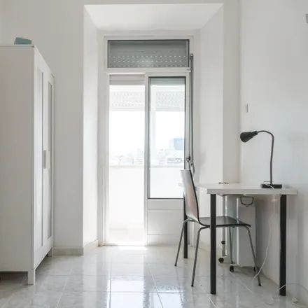 Rent this 9 bed room on Rua Carvalho Araújo 41 in 1900-140 Lisbon, Portugal