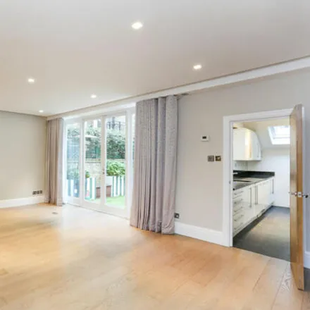 Rent this 4 bed townhouse on 34 Cadogan Lane in London, SW1X 9EJ
