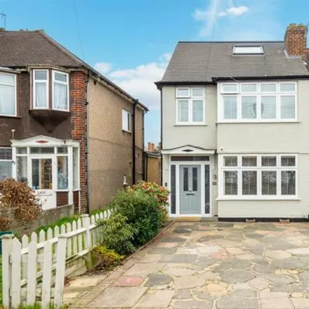 Buy this 4 bed house on Chertsey Drive in London, SM3 9UJ