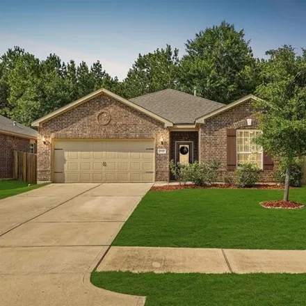 Buy this 3 bed house on Boulder Sunstone Lane in Conroe, TX 77305