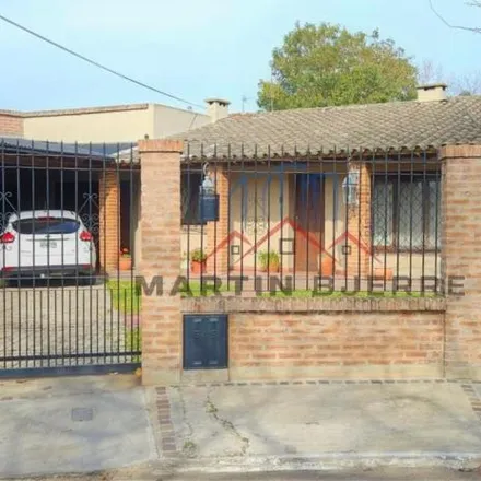 Buy this 3 bed house on El Gualacate in Partido de La Matanza, B1778 FQA Ciudad Evita