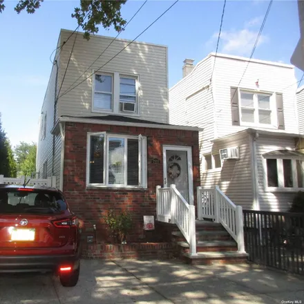 Buy this 3 bed house on 72-21 66th Drive in New York, NY 11379