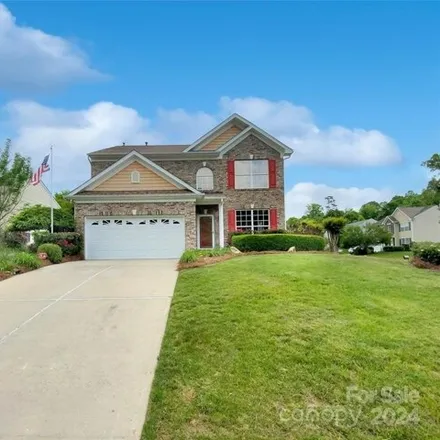 Buy this 4 bed house on 6086 Firethorne Lane in Cabarrus County, NC 28025