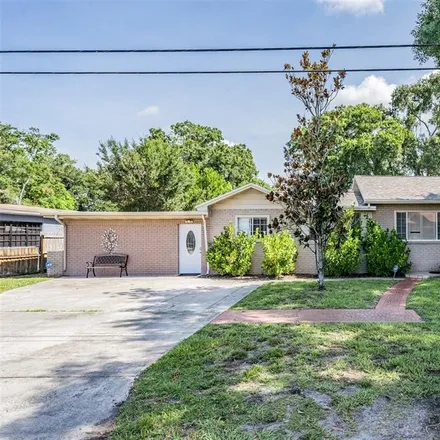 Buy this 4 bed house on 3323 West Walnut Street in Tampa, FL 33607