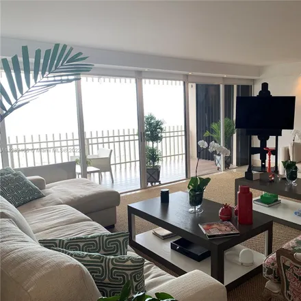 Rent this 2 bed apartment on Two Grove Island Drive in 2 Grove Isle Drive, Miami