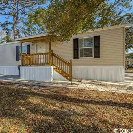 Buy this studio apartment on 69 Shamrock Circle in Garden City Beach, Horry County